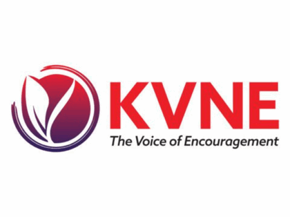 KVNE logo with red lettering and a circle with a figure of a plant growing. Red and purple colors.