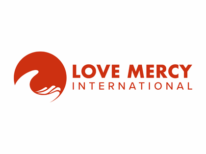 Love Mercy logo with red-orange lettering and a wave. 